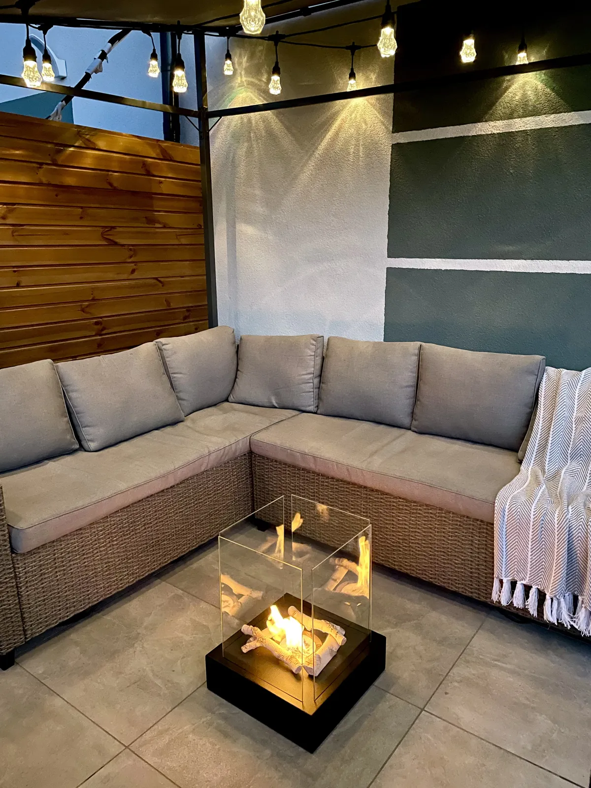 Sunset Garden Bioethanol Fireplace – Black in a home setting