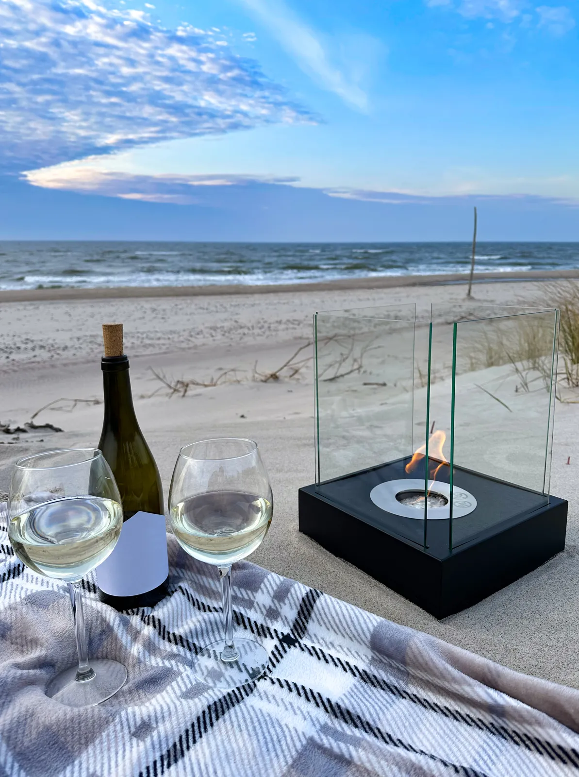 Sunset Garden Mini Bioethanol Fireplace – Black in a home setting