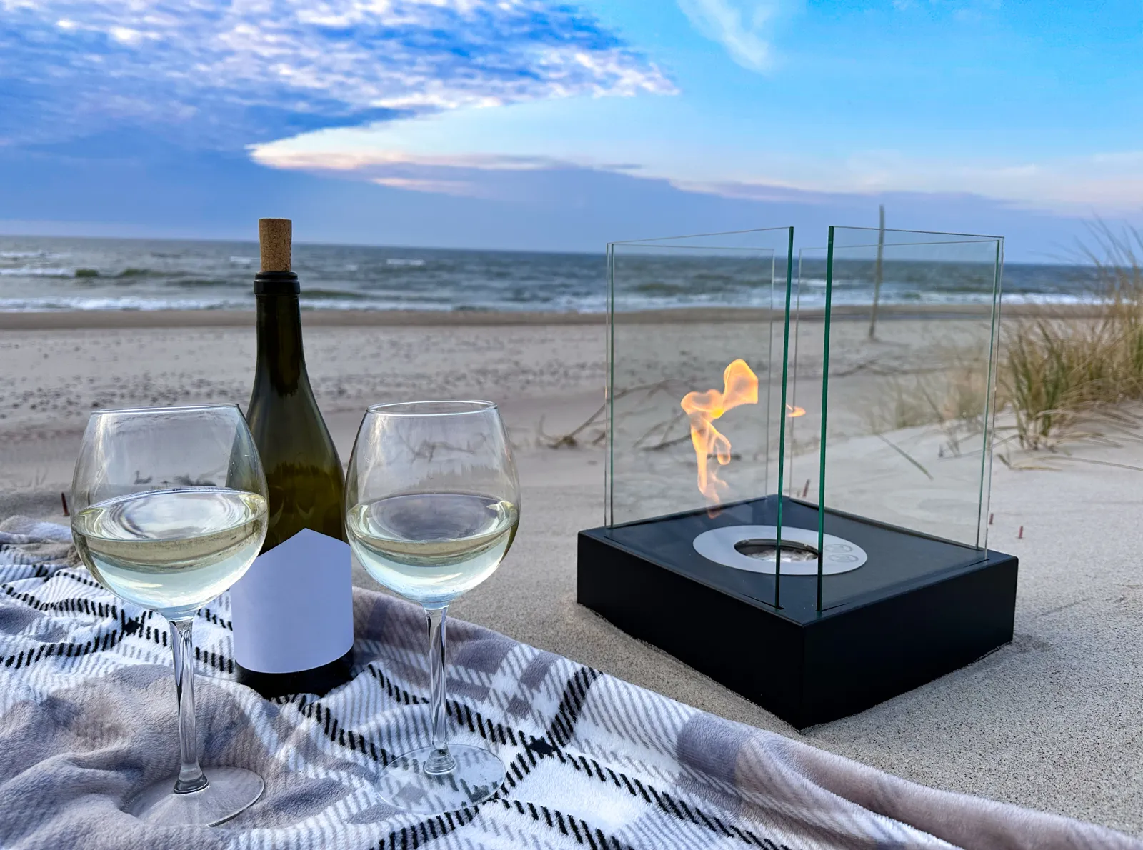 Sunset Garden Mini Bioethanol Fireplace – Black in a home setting