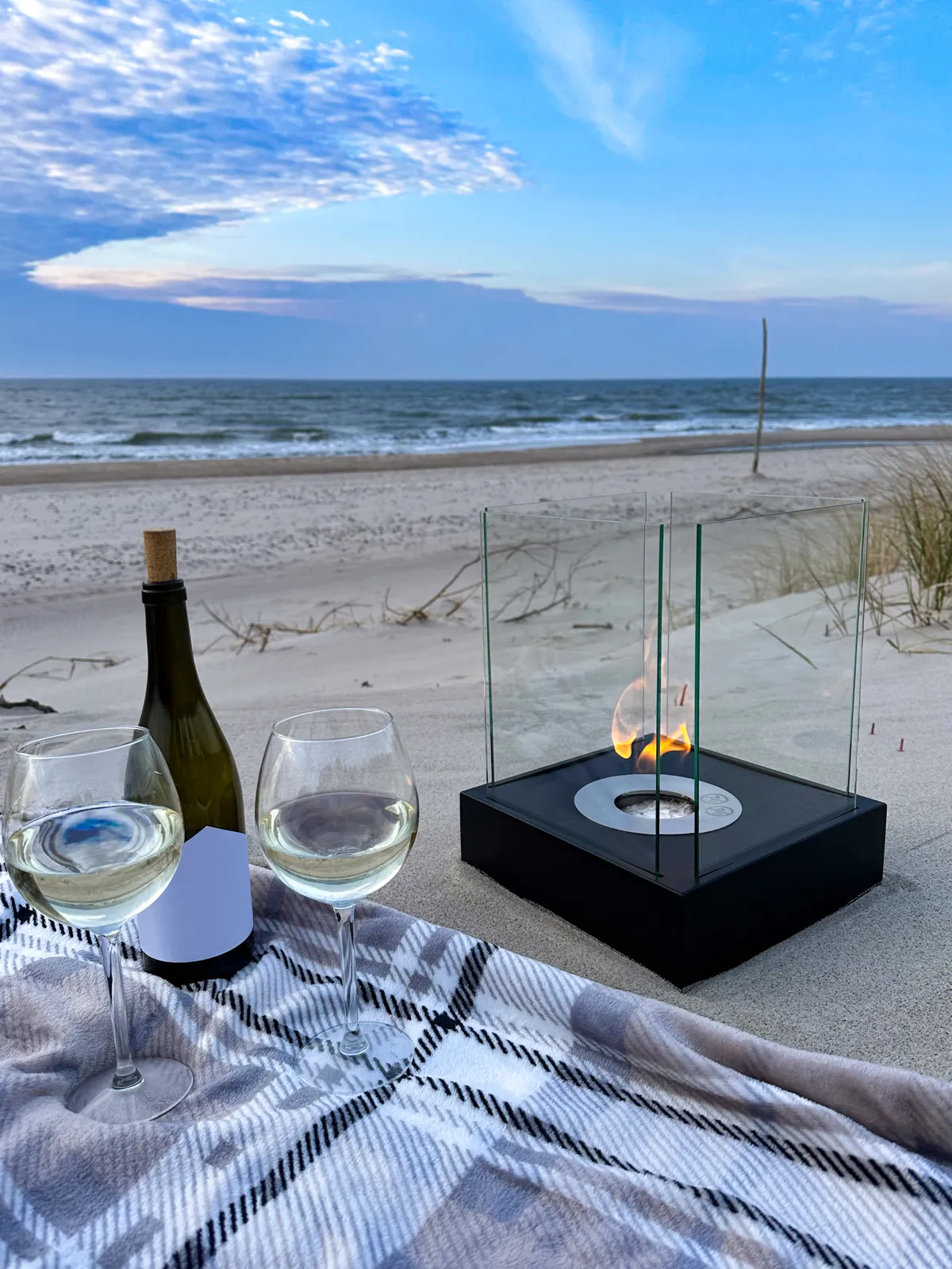 Sunset Garden Mini Bioethanol Fireplace – Black in a home setting