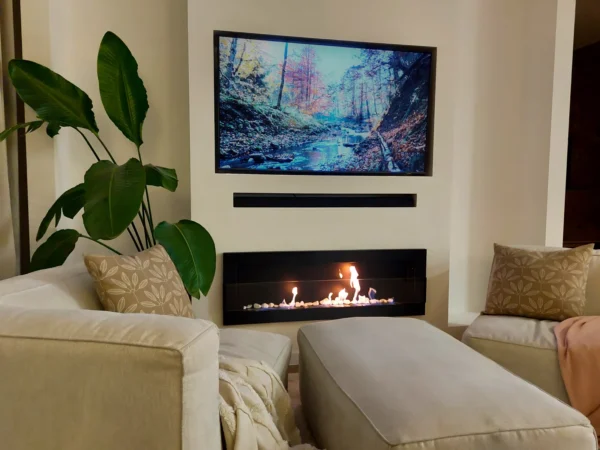 1200 Wall Mounted Bioethanol Fireplace – Matt black in a home setting